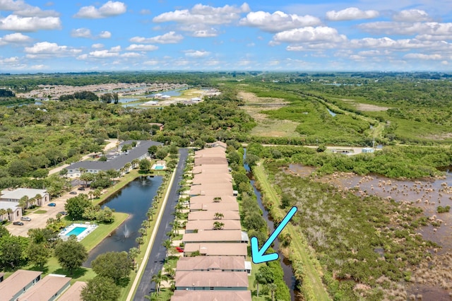 drone / aerial view with a water view