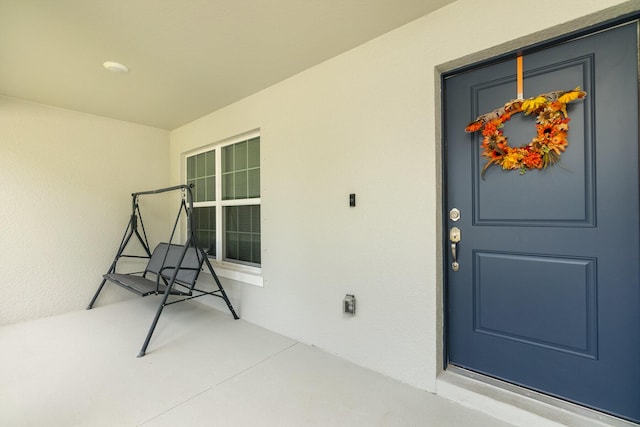 property entrance with a porch