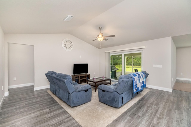 living room with hardwood / wood-style flooring, lofted ceiling, and ceiling fan