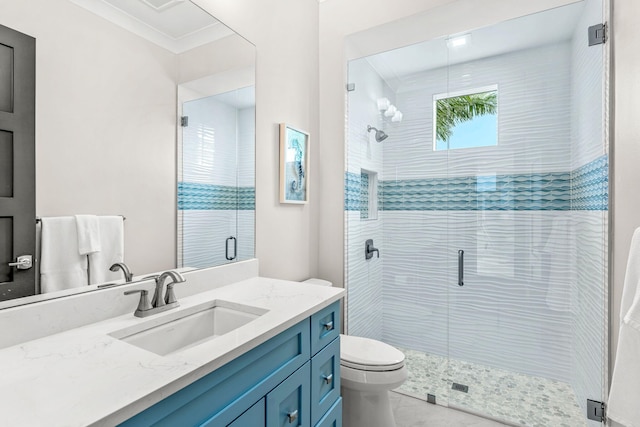 bathroom featuring vanity, an enclosed shower, crown molding, and toilet