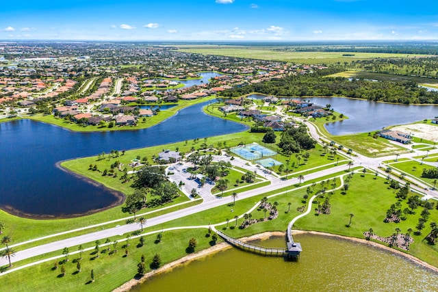 birds eye view of property featuring a water view