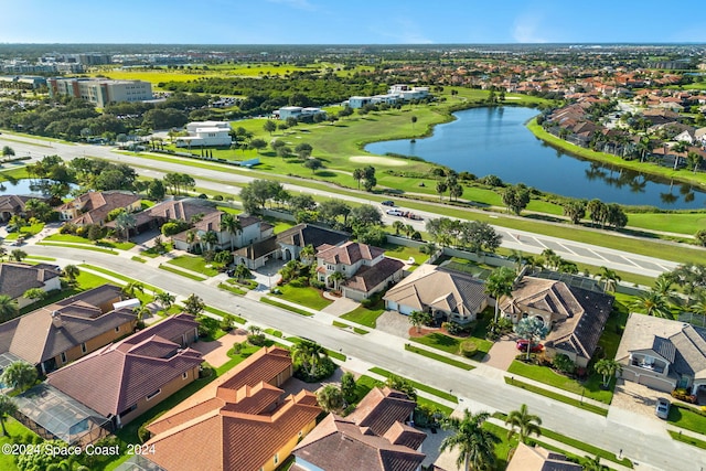 bird's eye view with a water view