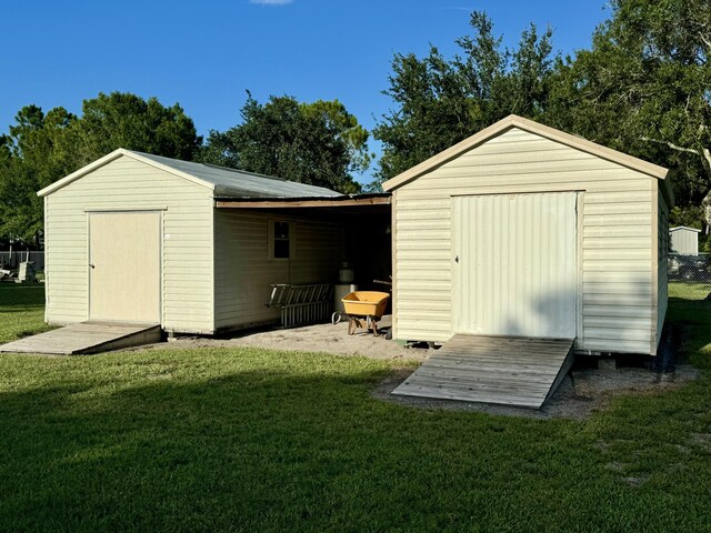 view of outdoor structure featuring a yard