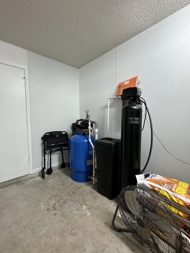 miscellaneous room featuring a textured ceiling