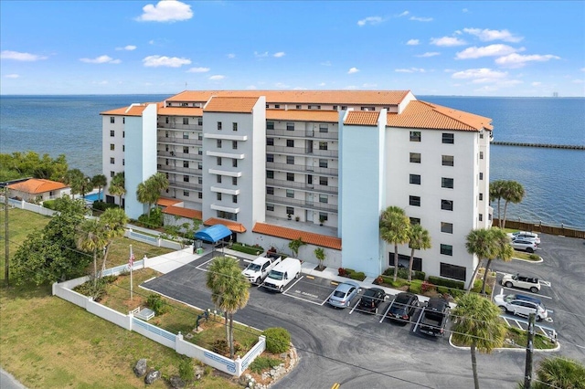 view of building exterior with a water view