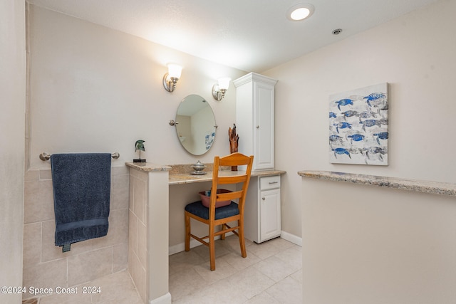 bathroom with vanity and tile patterned flooring