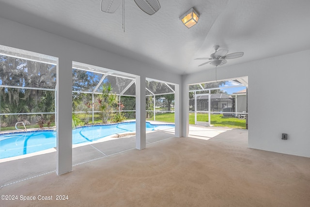 view of pool with ceiling fan