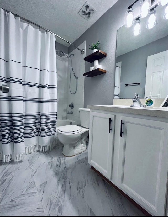 full bathroom featuring a textured ceiling, shower / bath combo, toilet, tile patterned floors, and vanity