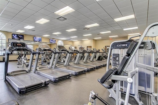 exercise room with a drop ceiling