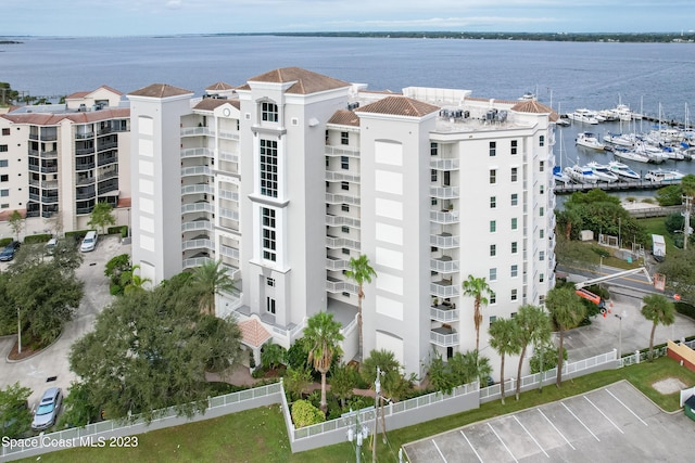 birds eye view of property featuring a water view