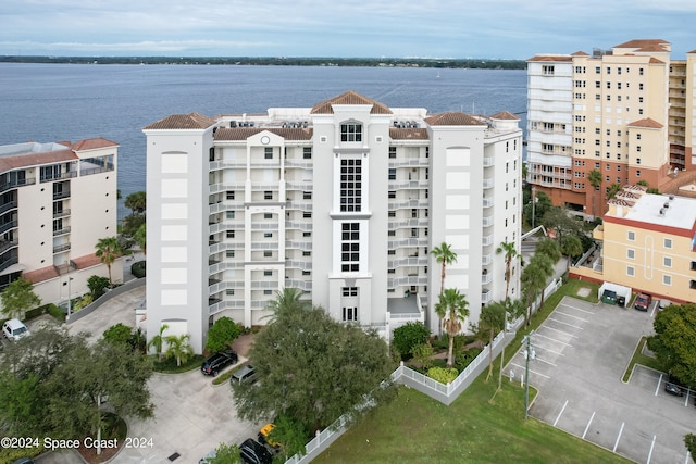 drone / aerial view with a water view