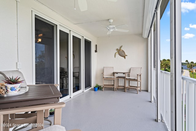 sunroom / solarium with ceiling fan