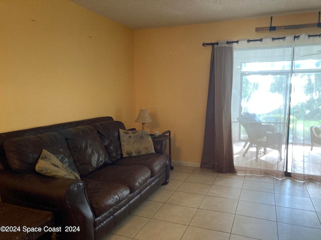 living room with light tile patterned floors