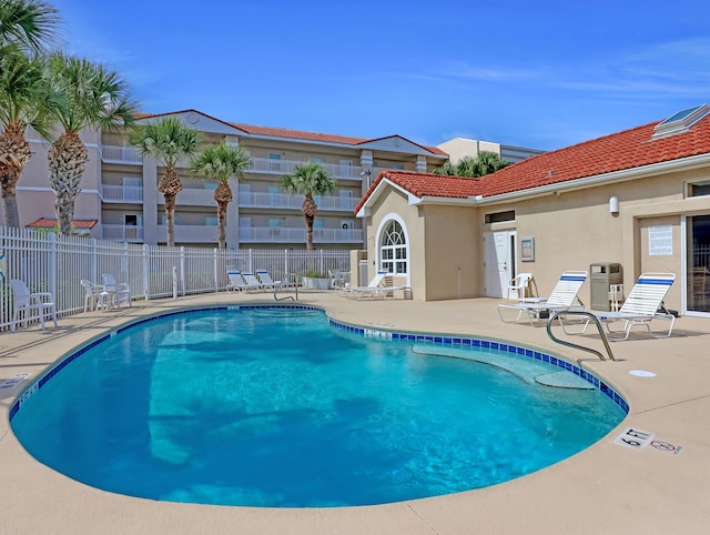 view of pool featuring a patio area