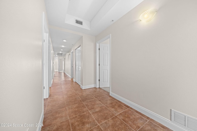 corridor featuring tile patterned floors