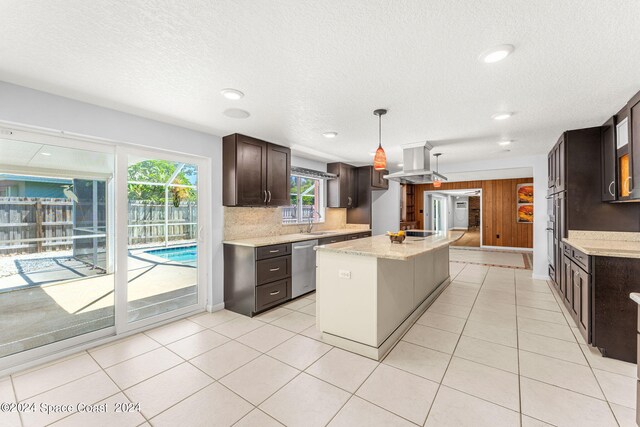 kitchen featuring pendant lighting, sink, stainless steel dishwasher, island range hood, and a center island