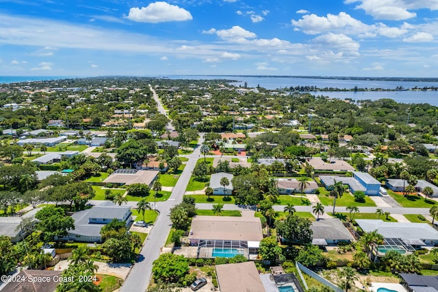 bird's eye view with a water view