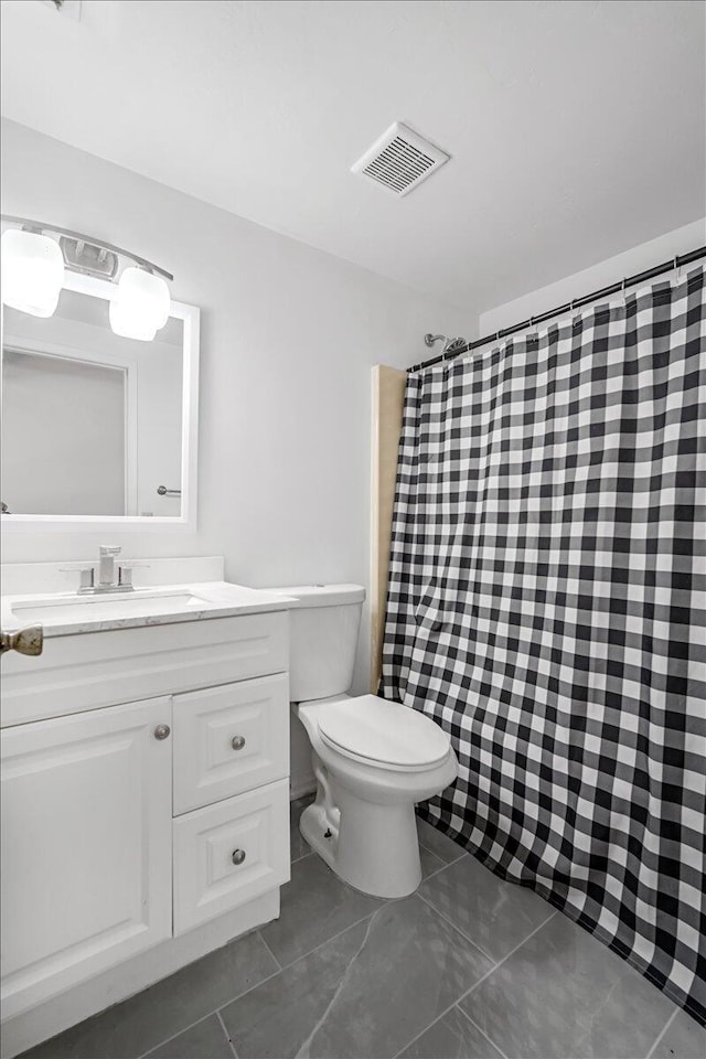7817 Maplewood Dr Unit 601, Melbourne, FL 32904 - full bathroom with a shower with shower curtain, visible vents, vanity, and toilet