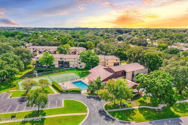 7817 Maplewood Dr Unit 601, Melbourne, FL 32904 - aerial view at dusk featuring a residential view
