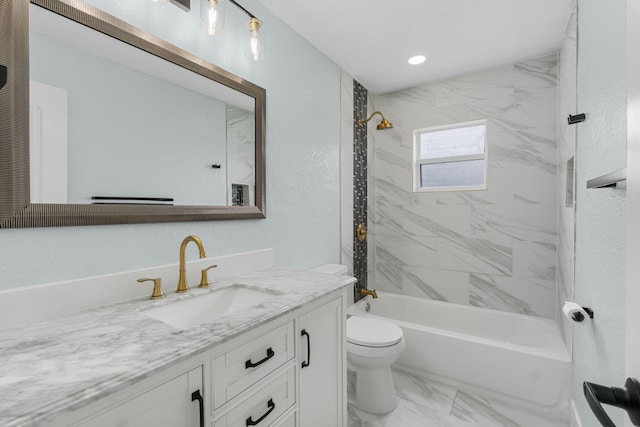 full bathroom featuring toilet, tiled shower / bath combo, vanity, and tile patterned floors