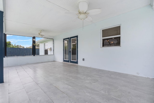 exterior space with french doors and ceiling fan