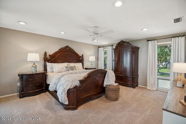 carpeted bedroom featuring ceiling fan