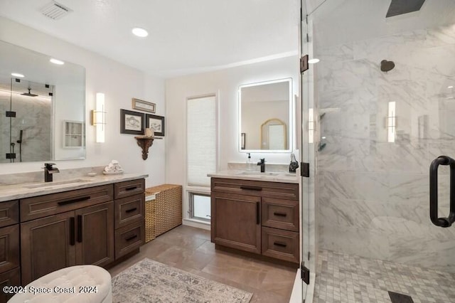 bathroom with vanity and walk in shower