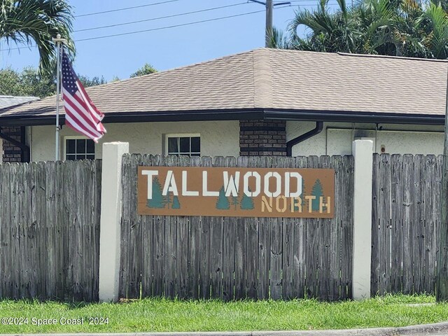 view of community sign