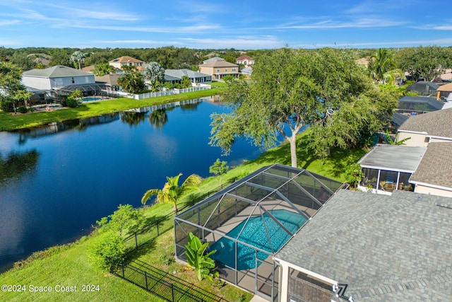 drone / aerial view with a water view