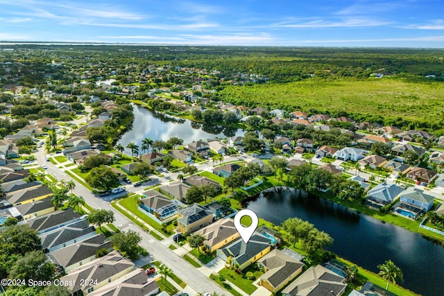 drone / aerial view featuring a water view