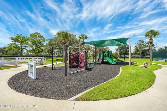 view of jungle gym with a yard