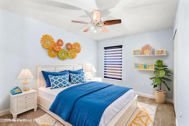 bedroom with ceiling fan and carpet