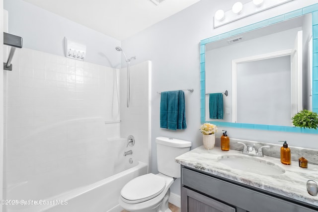 full bathroom with vanity, shower / washtub combination, and toilet