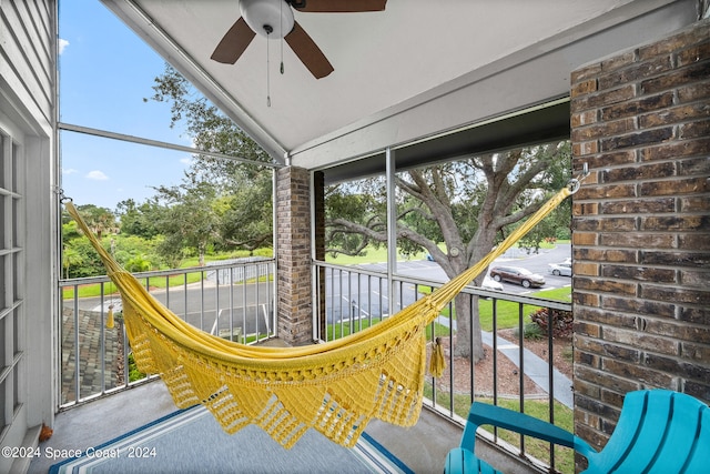 balcony featuring ceiling fan