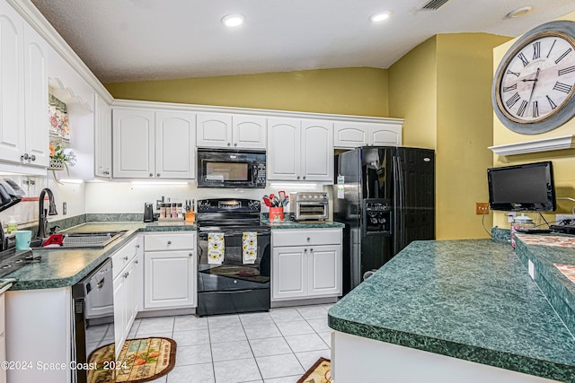 kitchen featuring light tile patterned floors, sink, lofted ceiling, black appliances, and kitchen peninsula