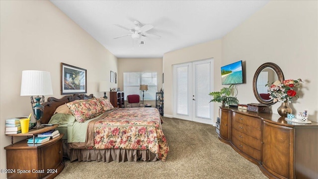 bedroom featuring ceiling fan, access to exterior, dark carpet, and french doors