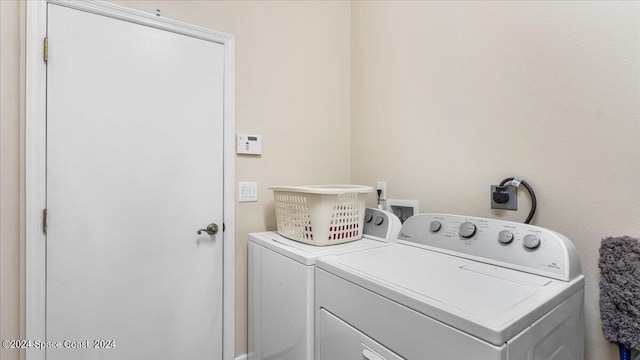 laundry area featuring washer and clothes dryer