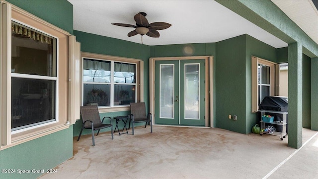 view of patio with ceiling fan and french doors