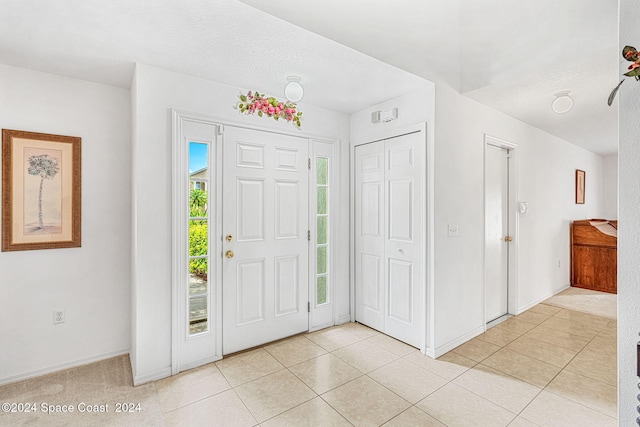 view of tiled foyer entrance