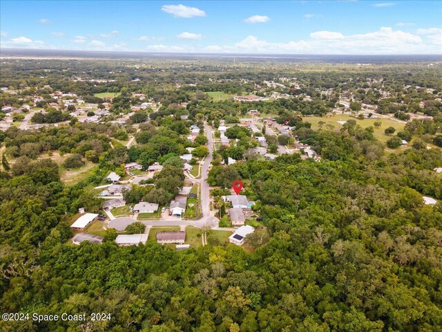 bird's eye view with a residential view and a view of trees