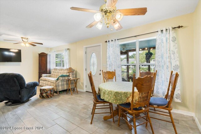 dining room with ceiling fan