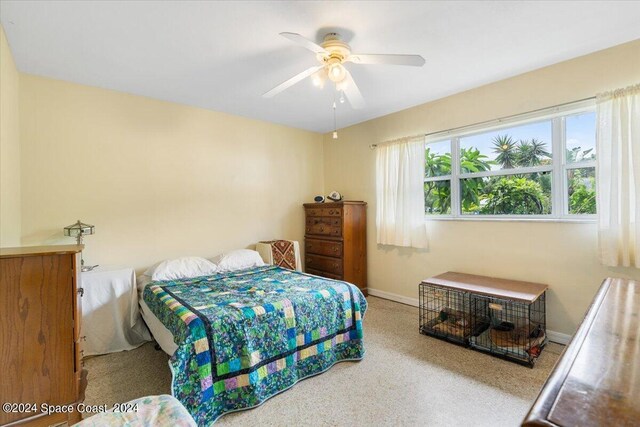 bedroom with carpet floors and ceiling fan