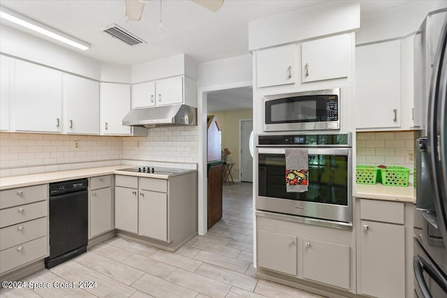 kitchen featuring ceiling fan, black appliances, and backsplash