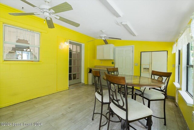 dining area featuring a wealth of natural light, light hardwood / wood-style flooring, and ceiling fan