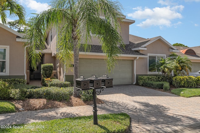 view of front of home featuring a garage