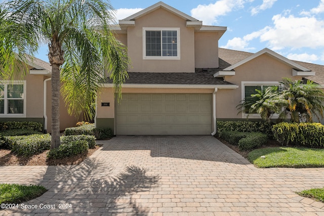 view of front of house with a garage