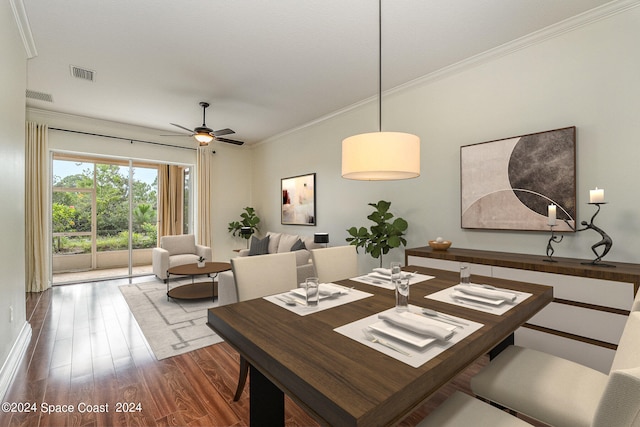 dining area with ceiling fan, ornamental molding, and hardwood / wood-style flooring