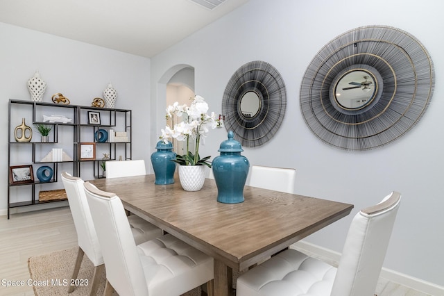 dining room with light hardwood / wood-style flooring