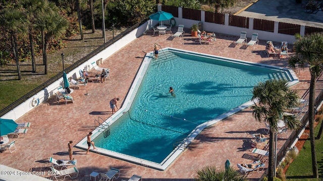 view of swimming pool featuring a patio