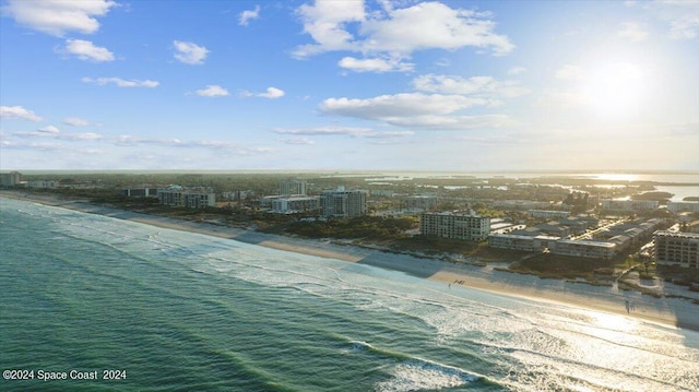 bird's eye view with a view of city, a beach view, and a water view